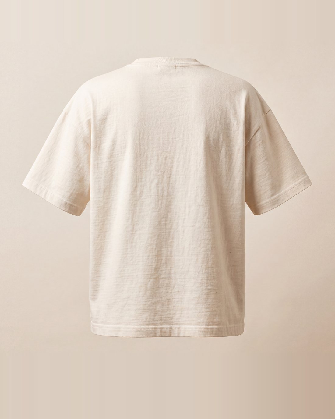 The raw cotton tee from the back, plain.